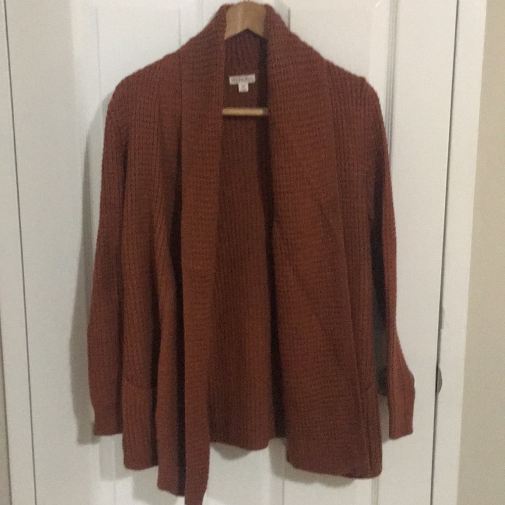 Rust orange open front cardigan.